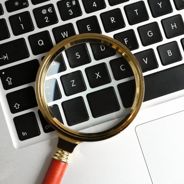 magnifying glass on keyboard